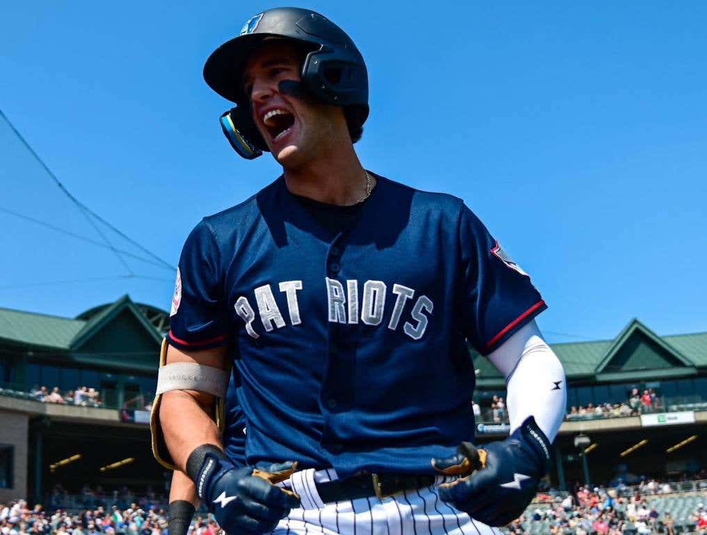 Spencer Jones celebrates his first inning homer.