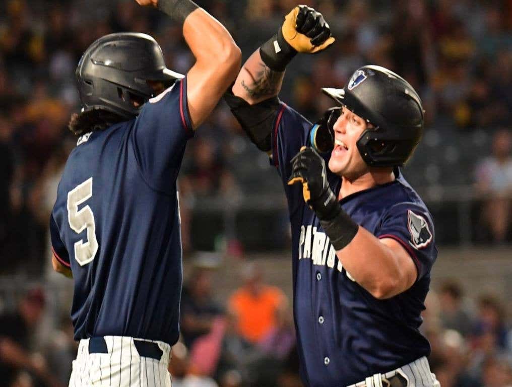 Eli Dunham celebrates a home run.