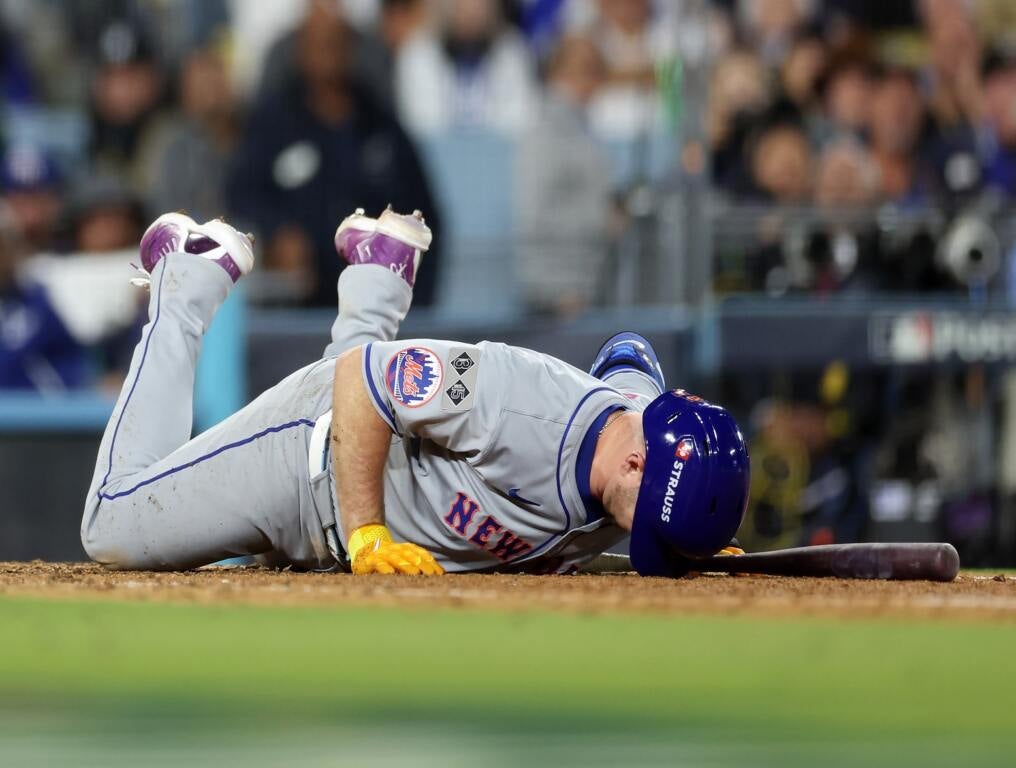 Pete Alonso tries to get himself up after strikeout. 