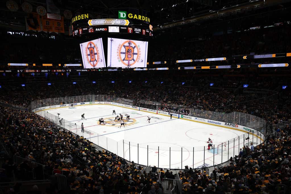 The puck drop at center ice to start the first period of the game between the New Jersey Devils and Boston Bruins at TD Garden