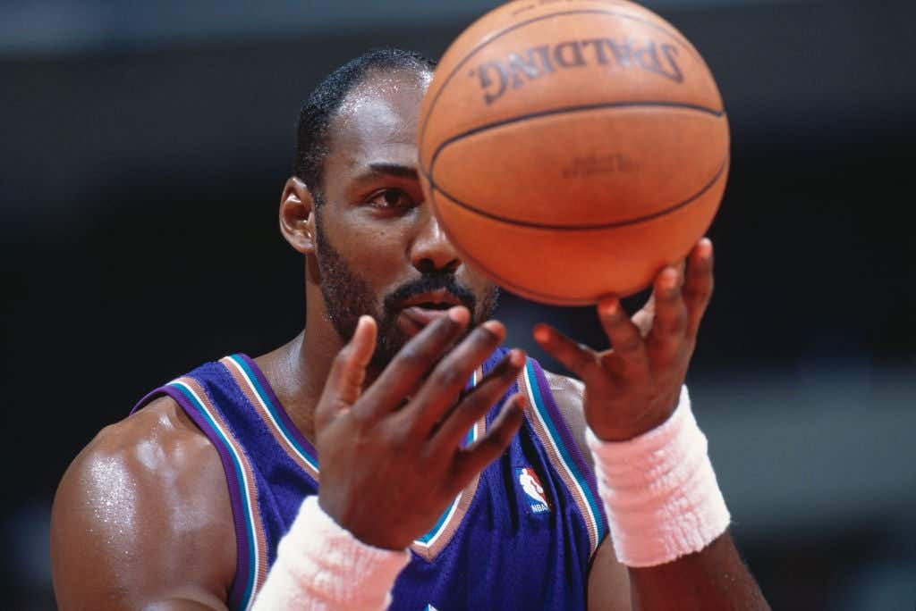 Karl Malone #32, Power Forward for the Utah Jazz looks at the basketball as he prepares to make a free throw.