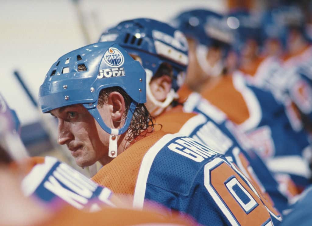 A portrait of Wayne Gretzky #99 of the Edmonton Oilers sitting on the bench during the National Hockey League