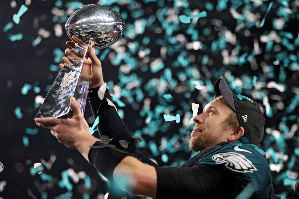 Quarterback Nick Foles #9 of the Philadelphia Eagles raises the Vince Lombardi Trophy after defeating the New England Patriots, 41-33, in Super Bowl LII