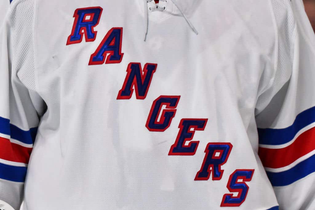 A close-up detail of the New York Rangers logo