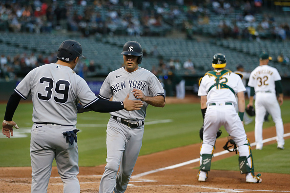 Giancarlo Stanton returns from injury, Yankees pound Athletics 13-4