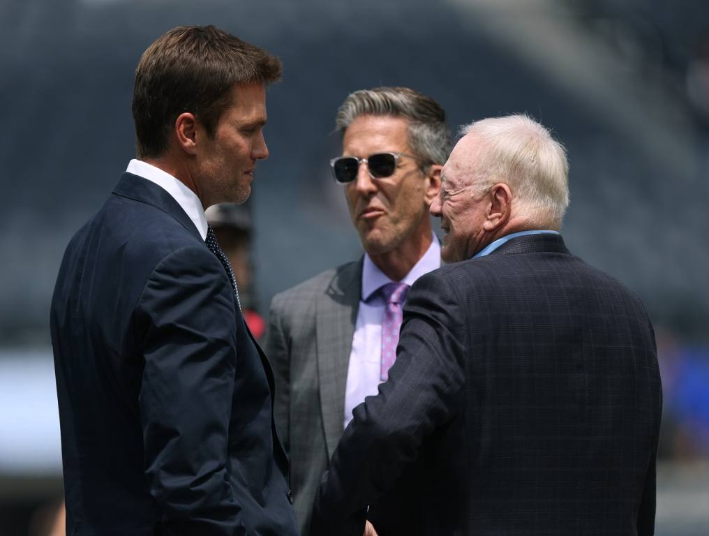 Tom Brady (L) with Kevin Burkhardt and Jerry Jones (R). 